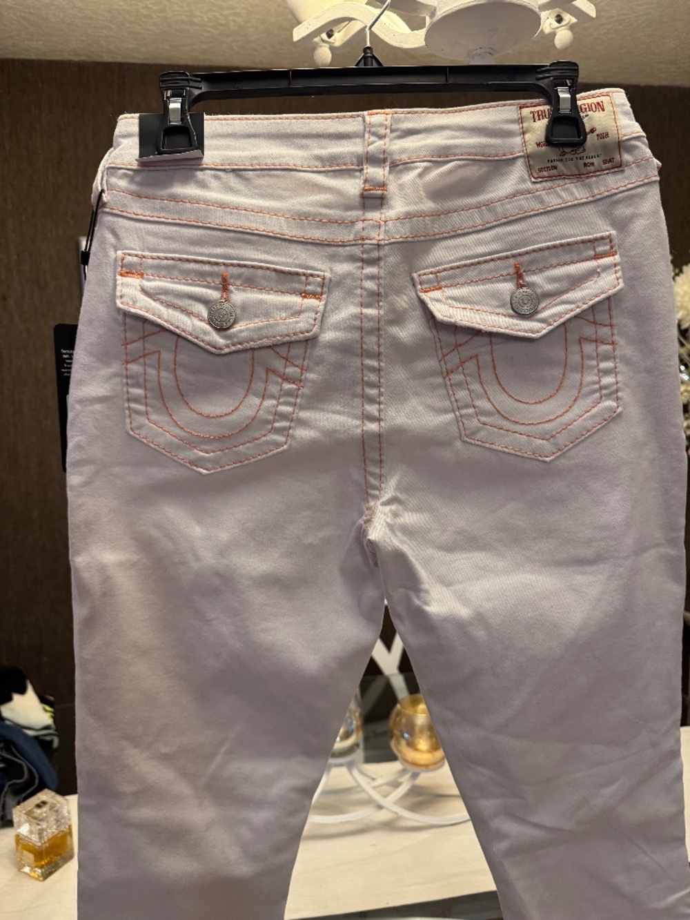 True religion  white with orange stitching size 29